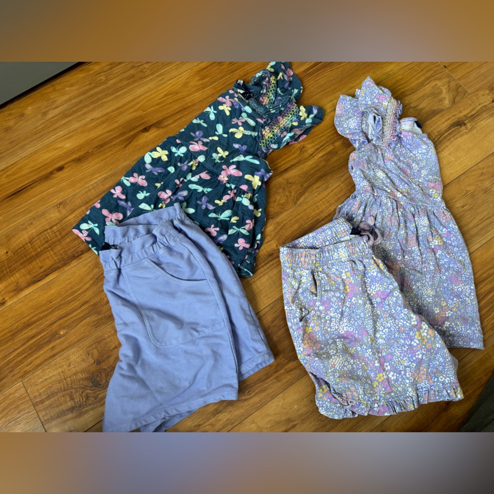 Lands and matching short and shirt sets. Two sets included. Great for summer.